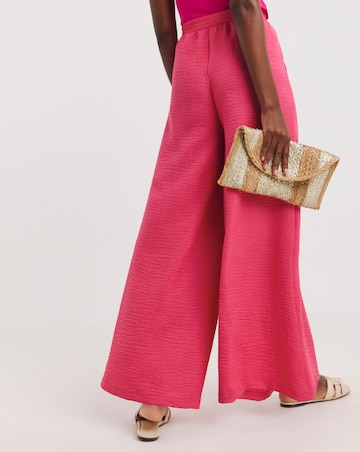 Pink Textured Wide Leg Palazzo Trousers