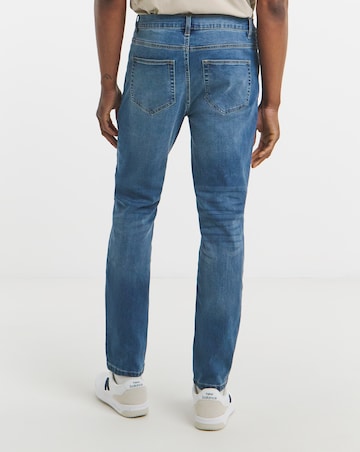 Tapered Fit Stretch Jeans Mid Wash