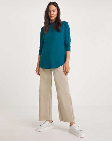 The Longline Curved Hem