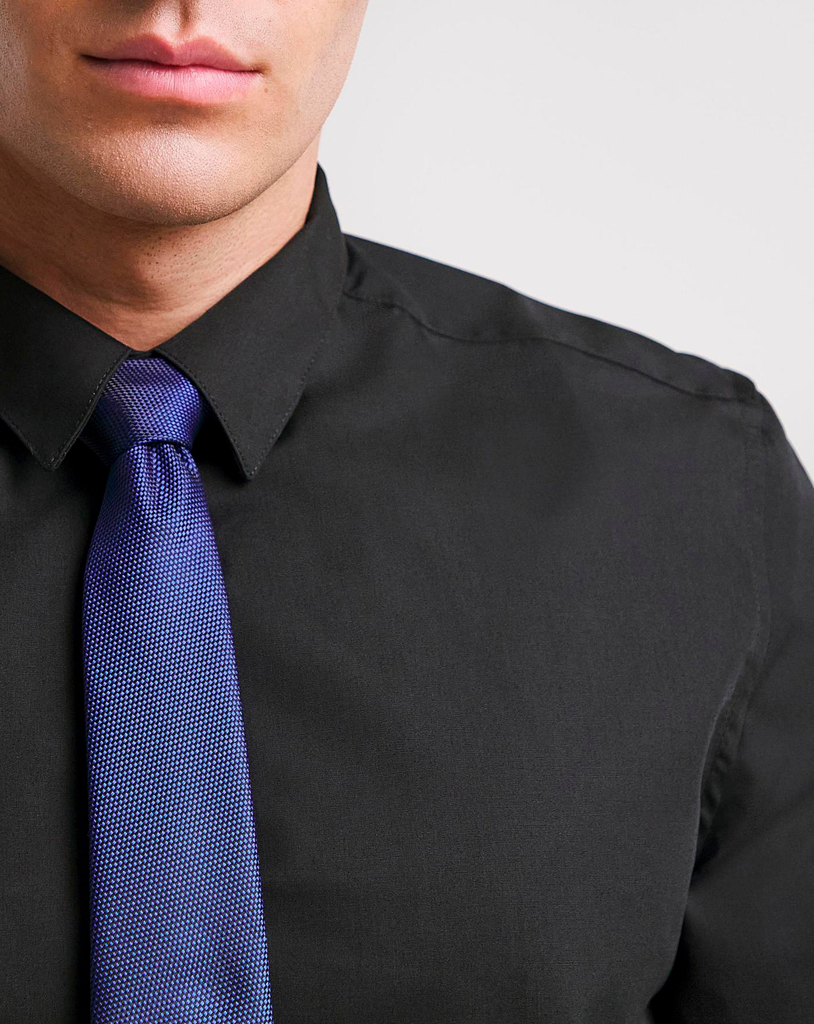 black shirt blue tie